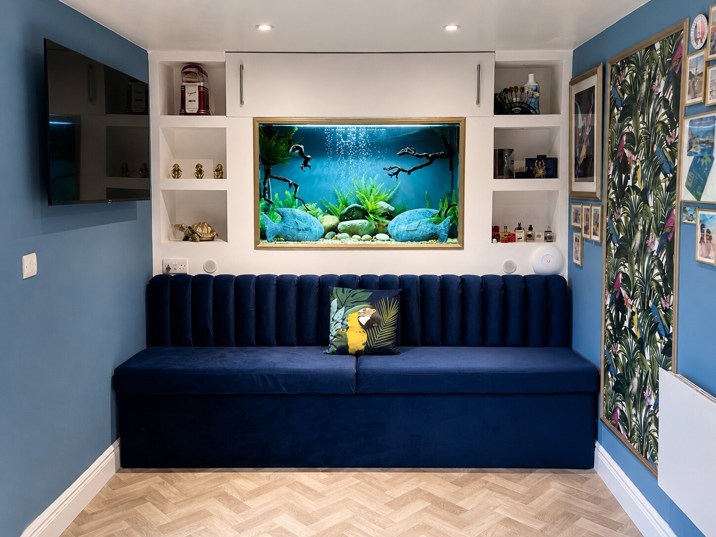 Complete feature wall with shelf downlighting and supplied, installed fish tank